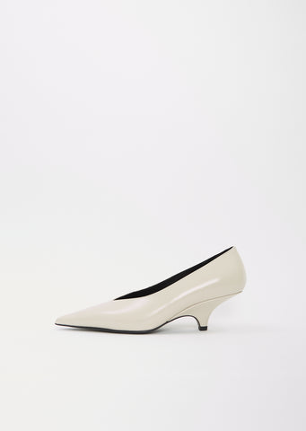 The Wedge-Heel Pump — Cream