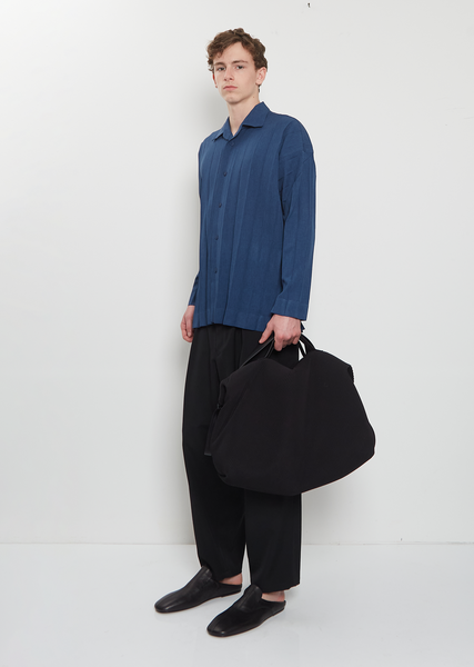 HOMME PLISSÉ PLEATS TRAVEL BAG Travel Bag — Black – La Garçonne