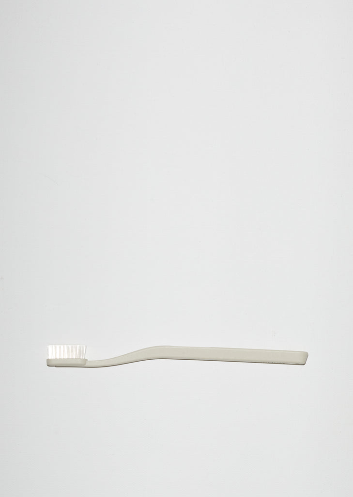 Tann Toothbrush