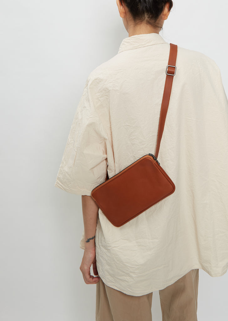Round-Flap Banana Bag — Dark Honey