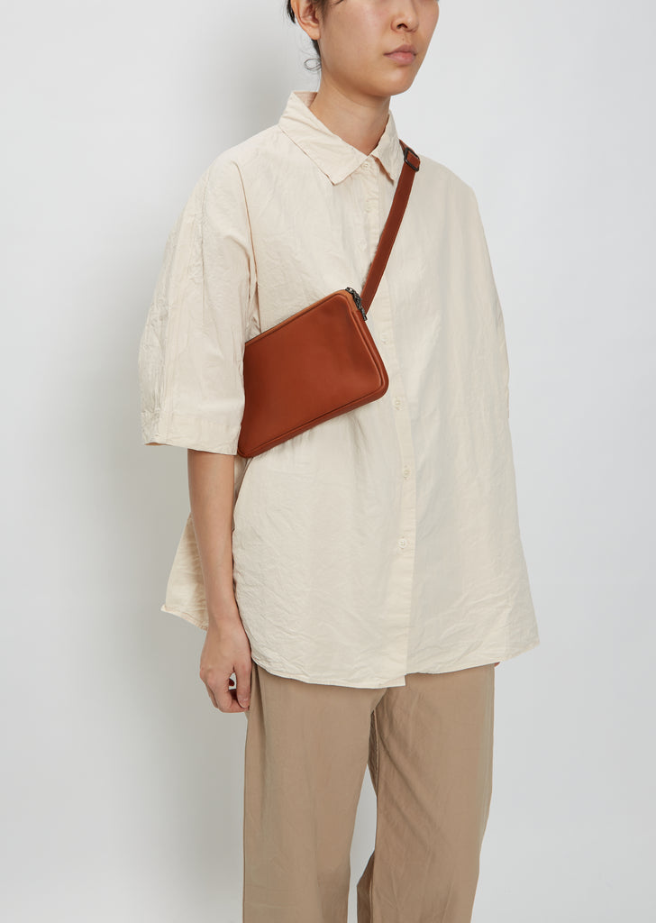 Round-Flap Banana Bag — Dark Honey