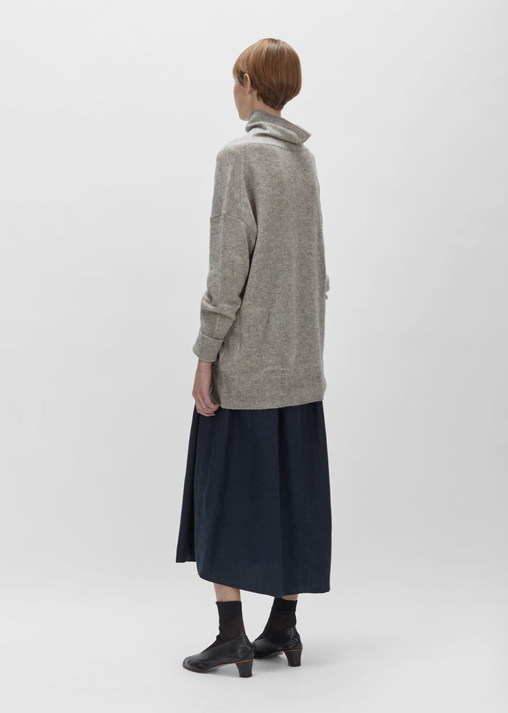 Wool Raccoon Turtleneck Sweater