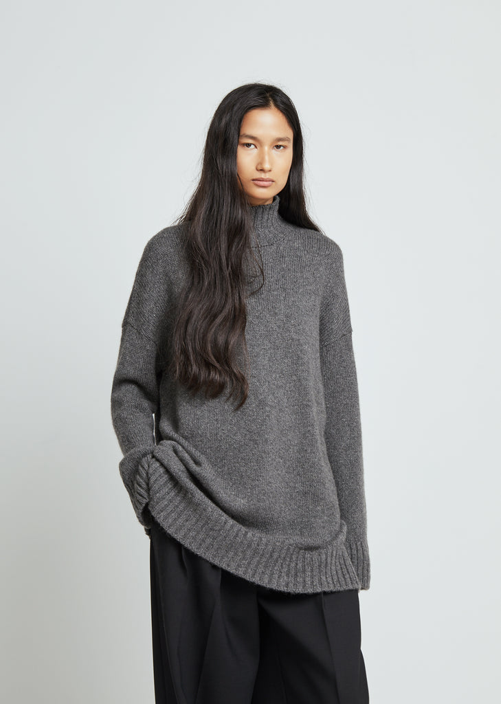 Cozy Cashmere Roll Neck Sweater