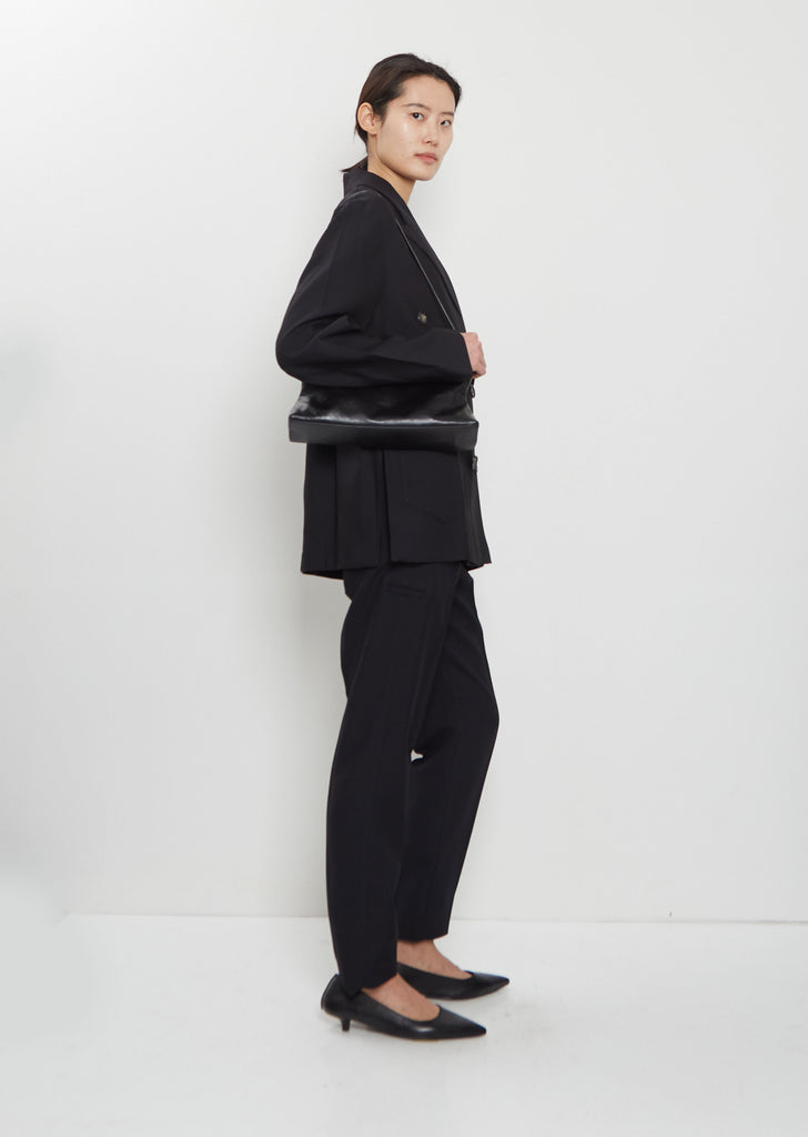 Dipi Leather Pochette Bag — Black