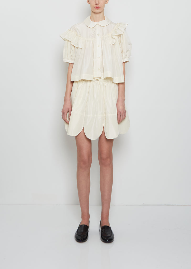 Petal Hem Mini Skirt