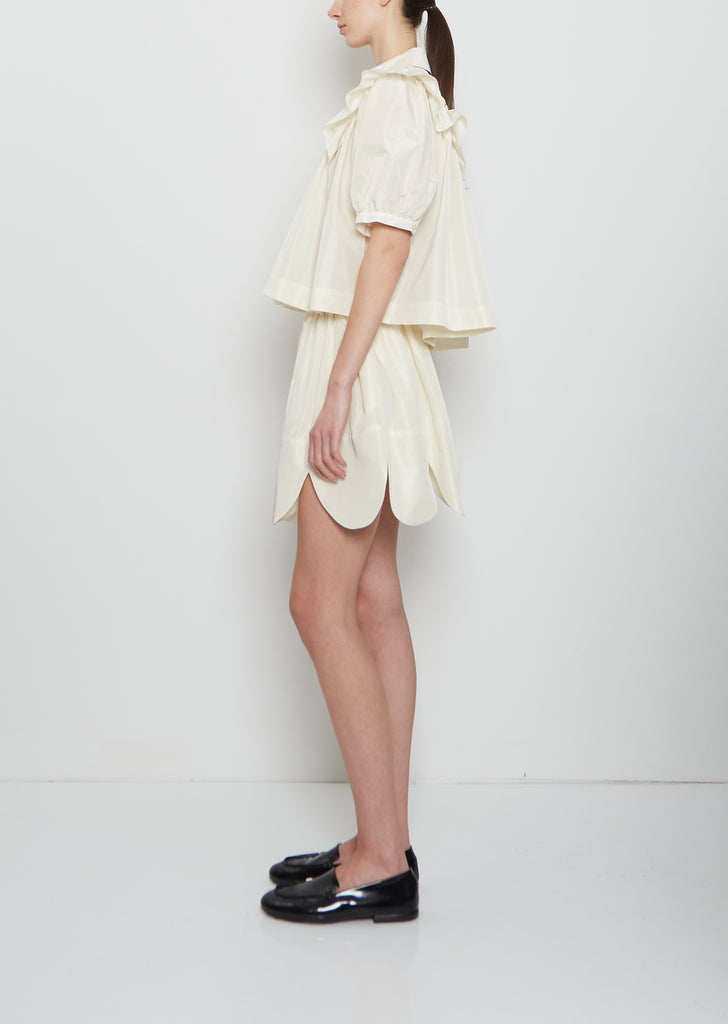 Petal Hem Mini Skirt