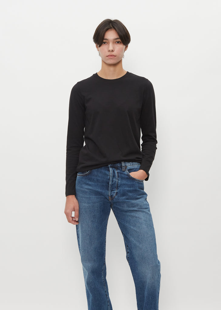 Four Outfits With a Black Sweater or Black Butter Top