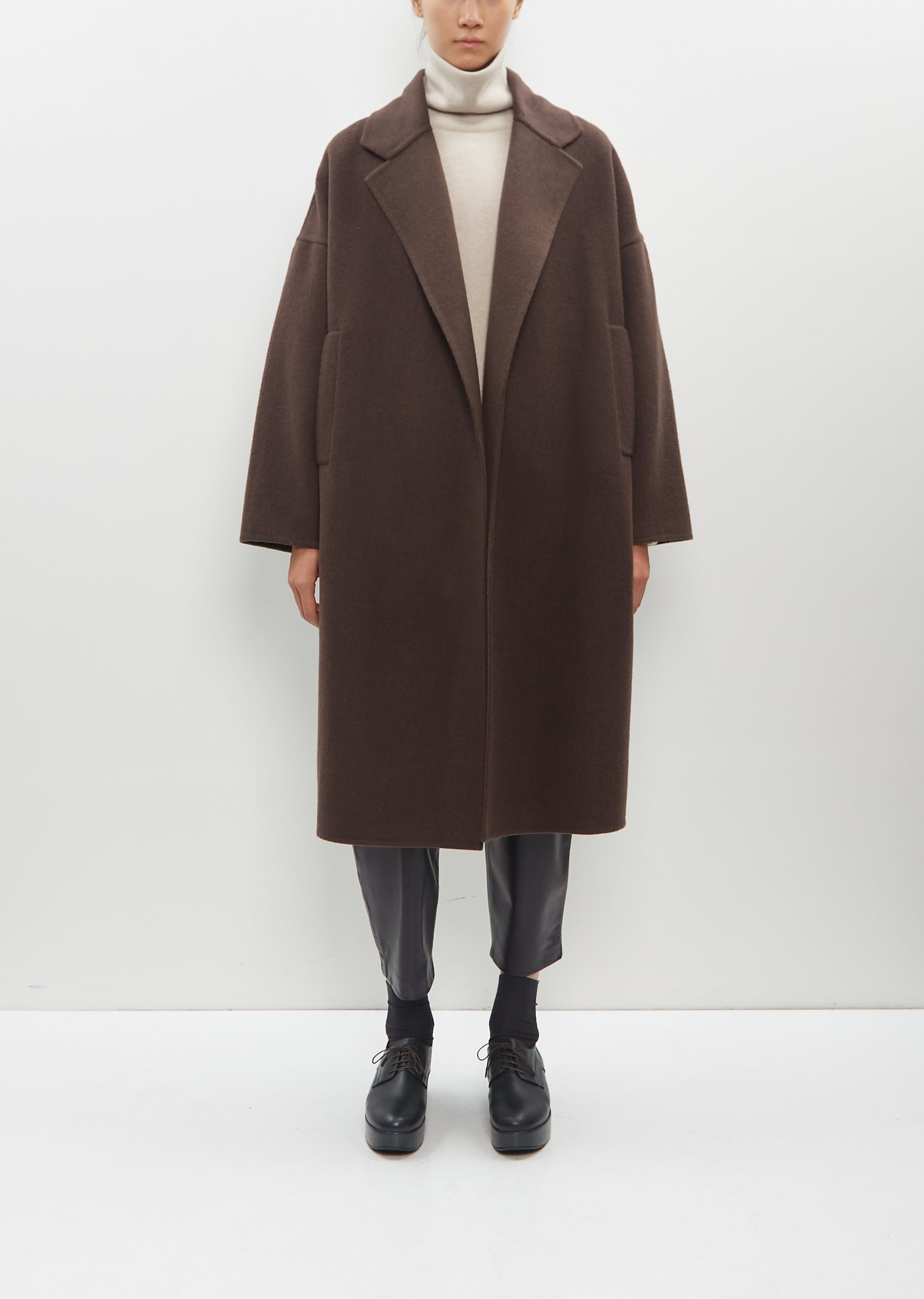 Double-breasted coat in herringbone cloth for men, black