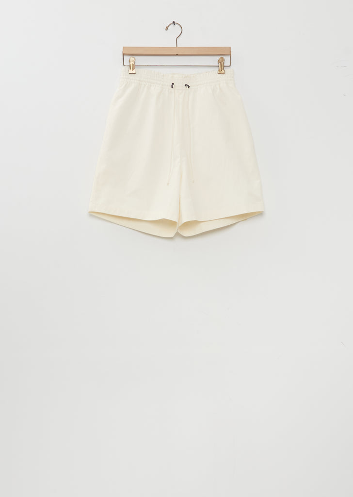 Knee Technical Shorts — Light Yellow