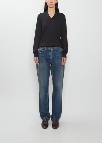 Front view of The Row Dinni Cotton Jean in medium indigo on a model.
