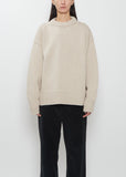 Front view of The Row Ophelia Wool Cashmere Top in sand beige with relaxed fit.