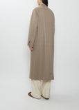 Rear view of Auralee cashmere moleskin long coat in beige.