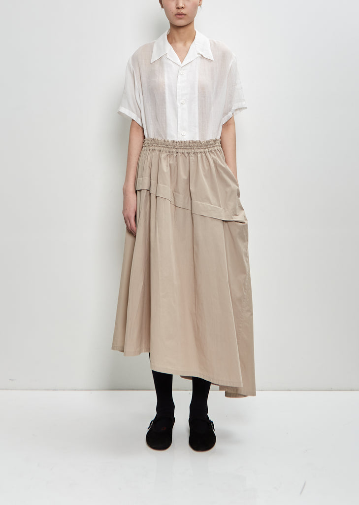 Cotton Tucked Asymmetry Skirt — Beige