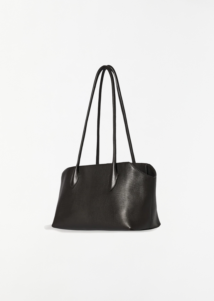 Secondary view of The Row small Terasse shoulder bag in black calfskin leather, showing its structured shape and straps.