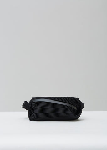 Bias Pleats Waist Bag in Black by Pleats Please Issey Miyake