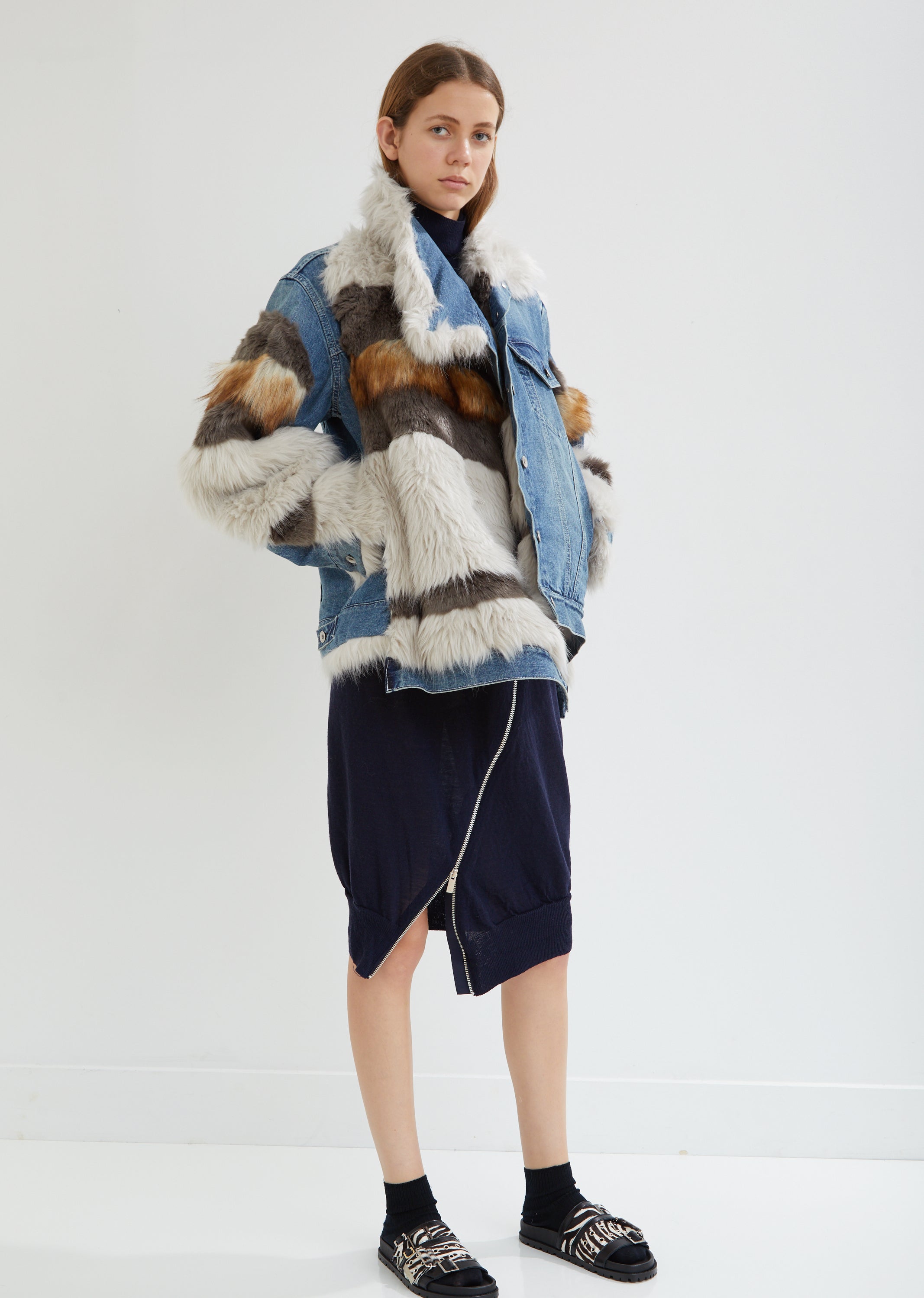 Zara Sasson pairs a vintage fur coat with a Louis Vuitton scarf, and Rock &  Republic jeans.