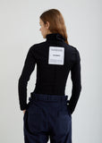 Fitted Inside-Out Long Sleeve Turtleneck Top