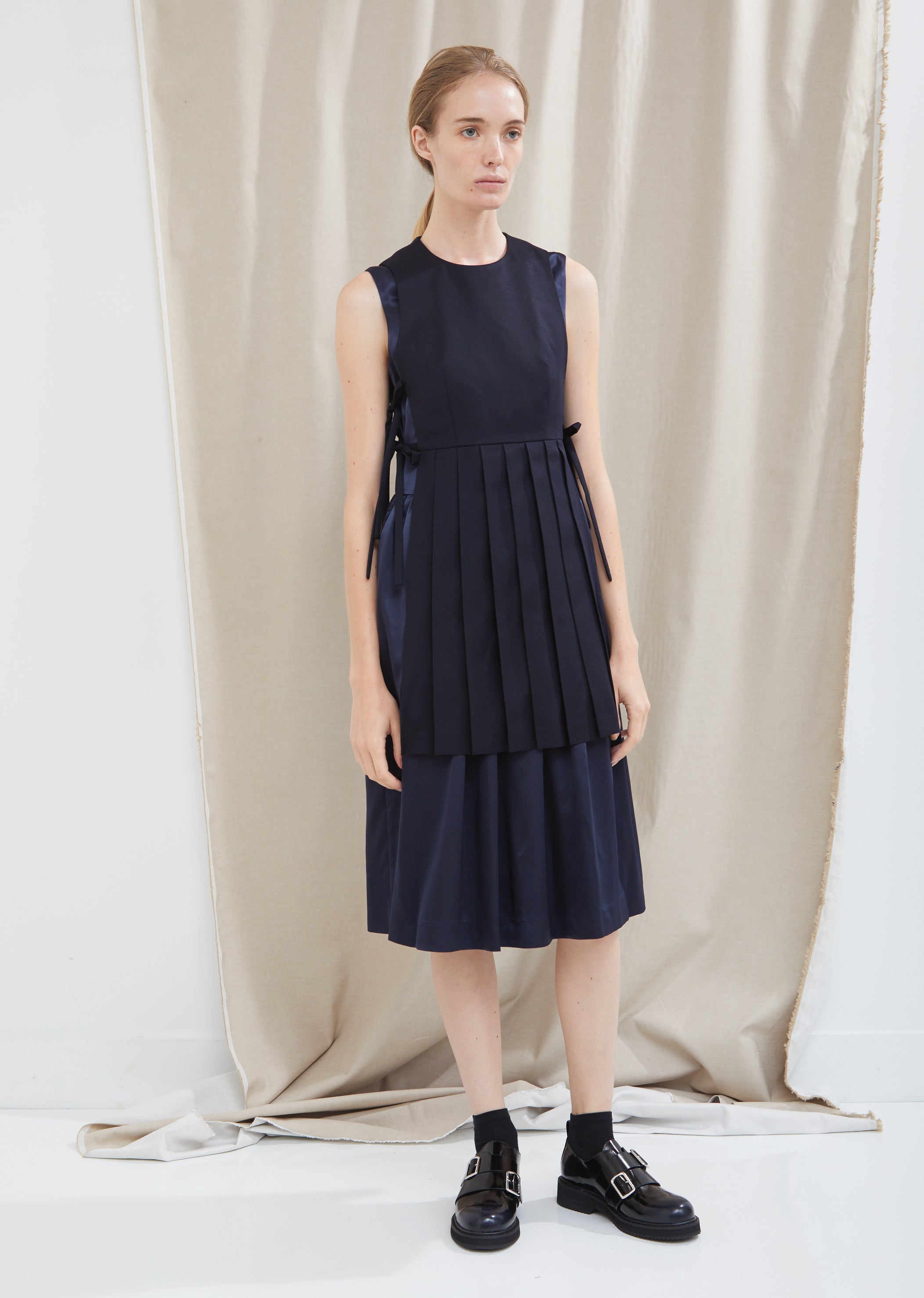 double layer pleated dress Unique Double-Layered Pleated Bell Sleeve Hip Dress The Woman Concept