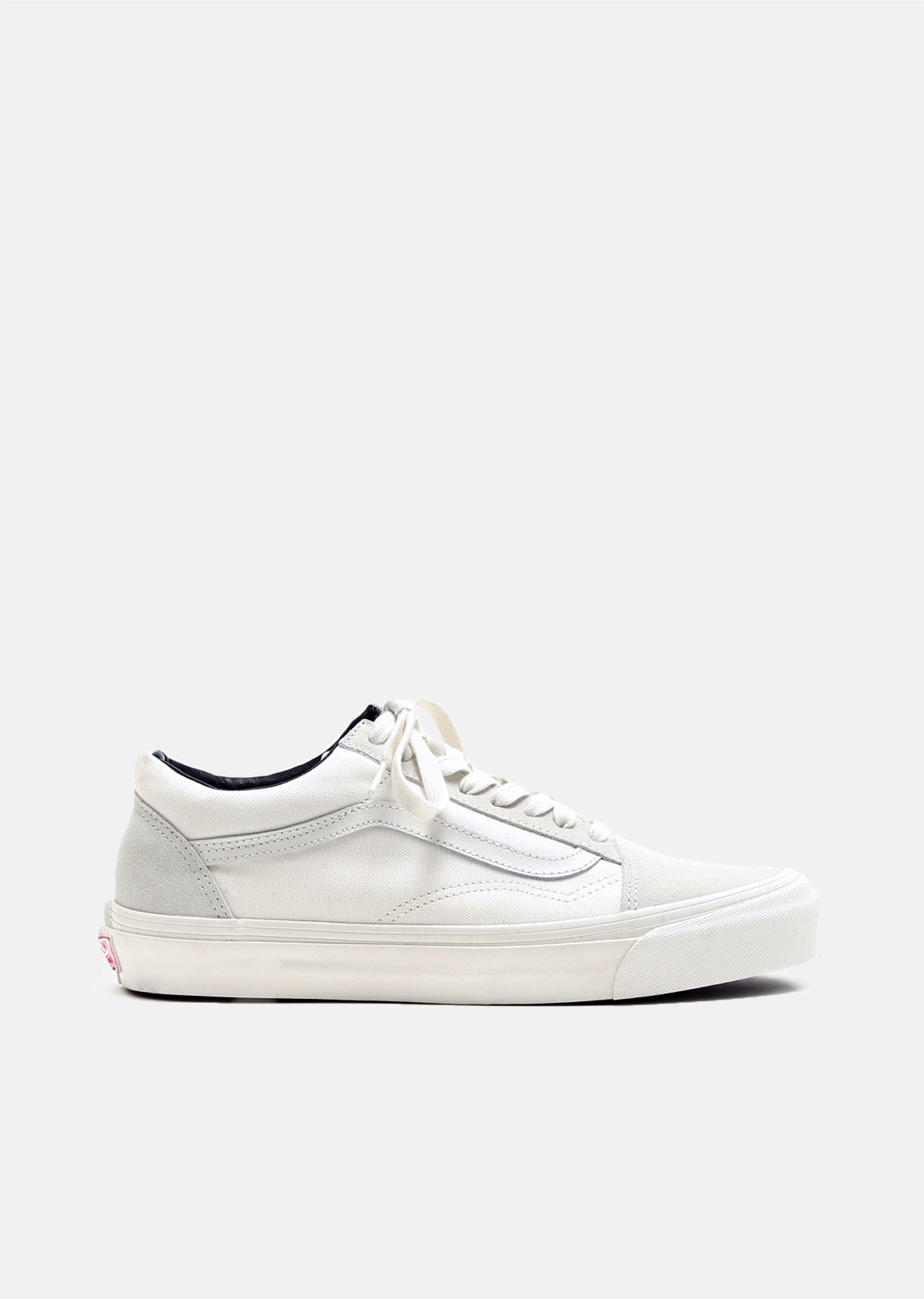 Vans® Unisex Classic Slip-On Platform Sneakers in White Canvas