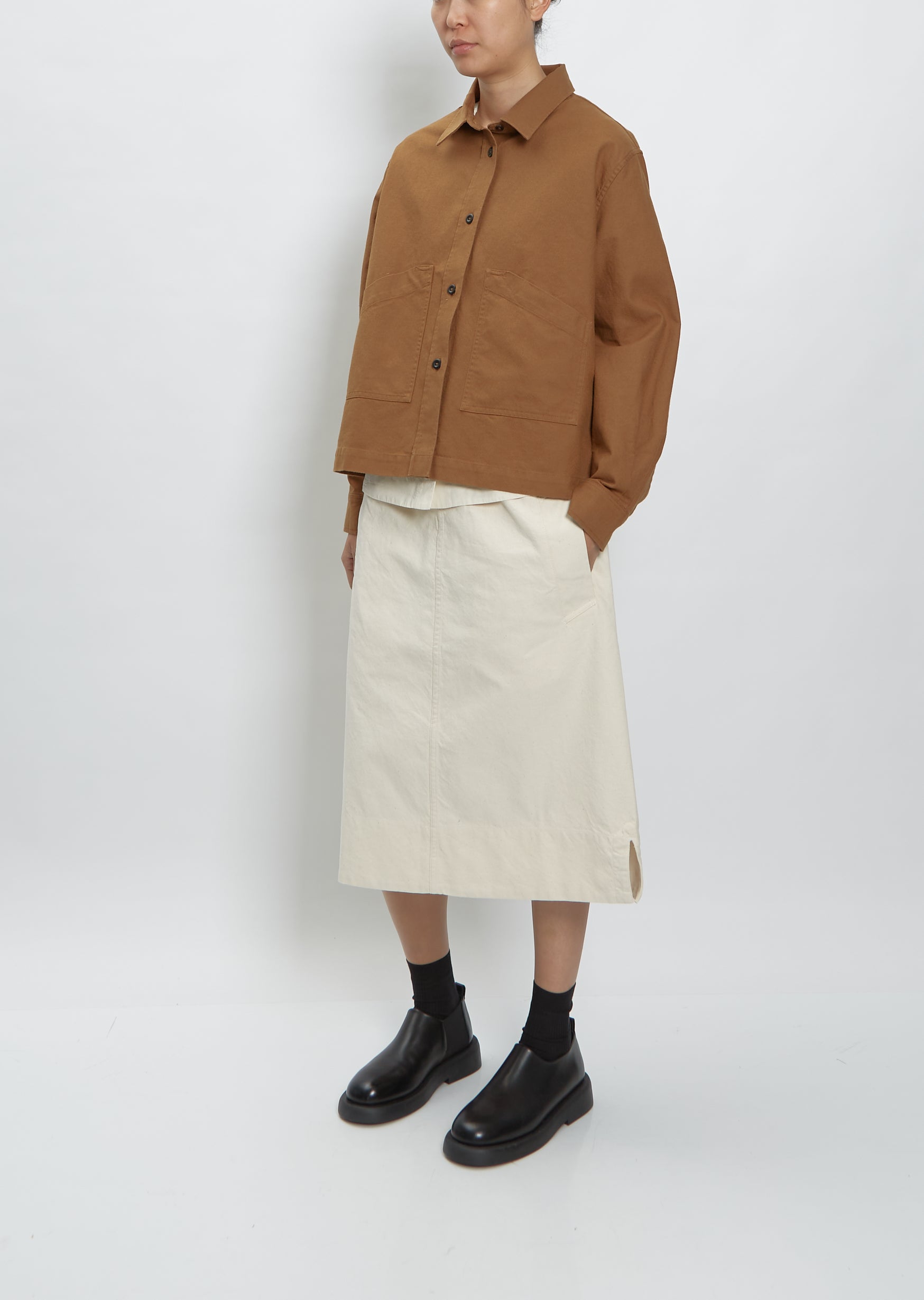 tobacco overshirt REGULAR FIT SUEDE LEATHER - Extra stitching can be found on the garment due to smaller pieces of suede being stitched together Understated luxury meets everyday sophistication.