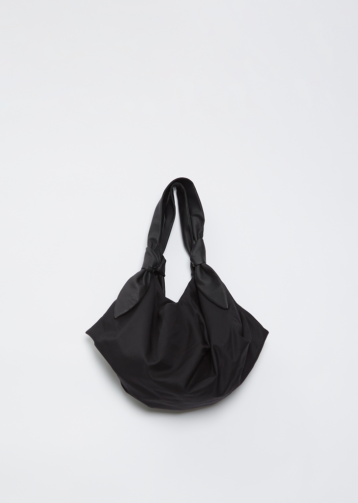 Folded Bag With Knotted Straps